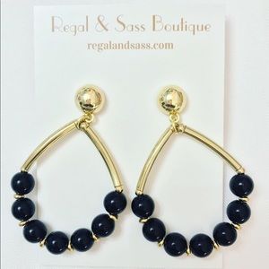 Gold and beaded navy earrings